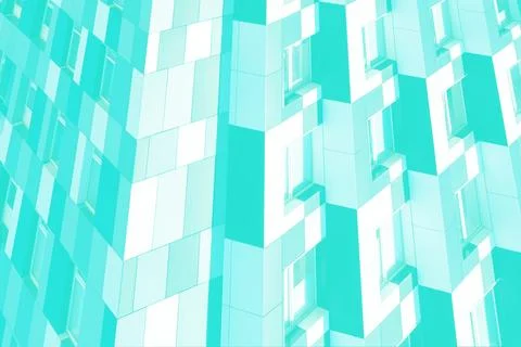 Abstract architectural design featuring a repeating geometric pattern on a bu Stock Photos