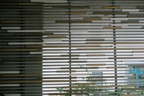 Abstract architectural detail featuring parallel wooden elements design Fotos Stock