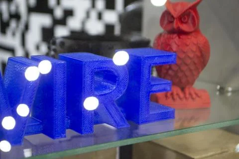 Abstract art object letters printed 3D printer Colored blue creative model Stock Photos