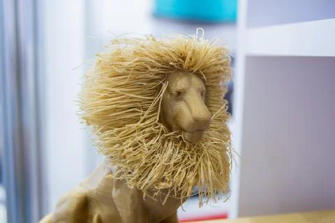 Abstract art object lion printed 3D printer Colored light brown creative model Stock Photos
