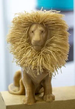 Abstract art object lion printed 3D printer Colored light brown creative model Stock Photos