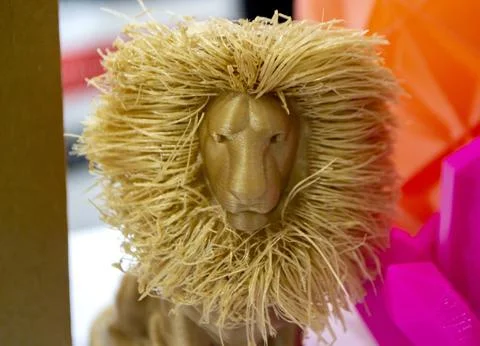 Abstract art object lion printed 3D printer Colored light brown creative model Stock Photos
