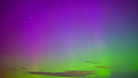 Abstract Aurora Background with Purple and Green Light and Stars Stock Footage 331354134