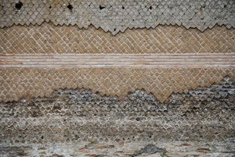 Abstract authentic pattern of the ancient stone pattern. Wall of the typical  Stock Photos