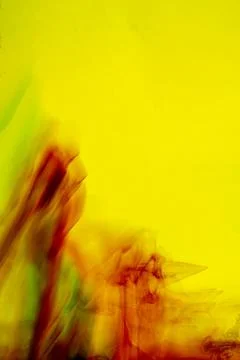 An abstract backdrop featuring a bright yellow canvas with dynamic red, ora.. Stock Photos