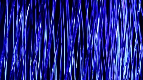 Abstract backdrop video of strings moving by the wind with blue lighting. Stock Footage 146727053