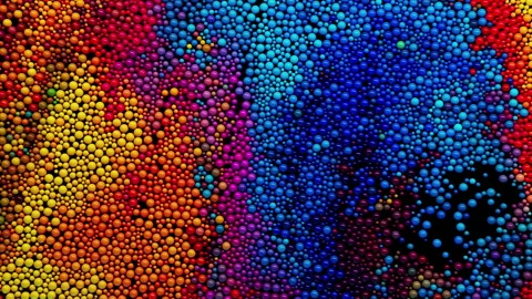 Abstract background. 3D animation consisting of multicolored spheres in orang Stock Footage 224671577