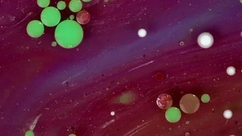 Abstract background. Acrylic colorful bubbles mixing in oil Video stock 89811972