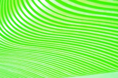 Abstract background and beautiful texture of bright green curved slats. Stock Photos