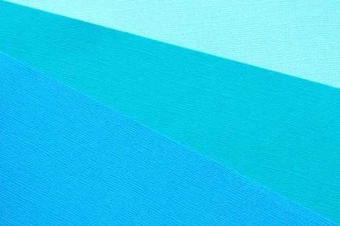 Abstract background and texture of three blue paper in different shades... Stock Photos