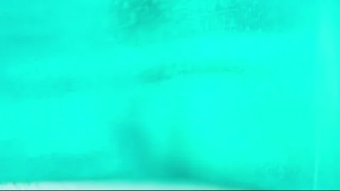 Abstract background of azure color liquid with moving particles Stock Footage 280669306