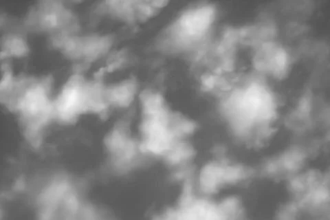 Abstract background based on clouds of uncertain shape in dark gray sky Foto stock