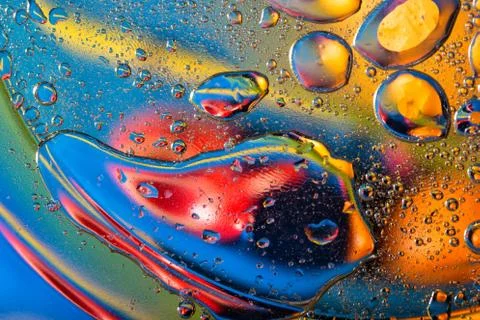 Abstract background with big and small oily drops Foto stock