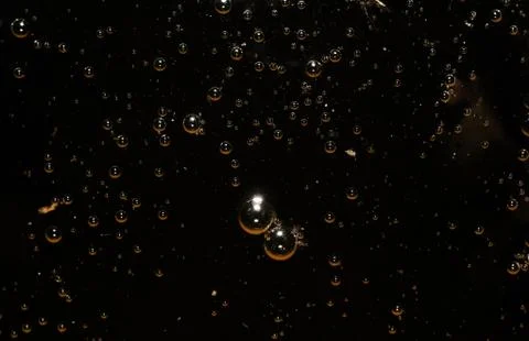 Abstract background - black water surface with bubbles Stock Photos