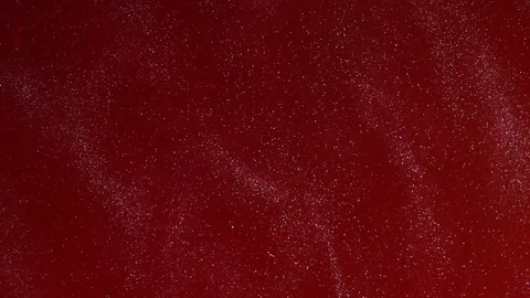 Abstract Background Blood Red Clouds with Curtains of Silver Glitter Stock Footage 76589254