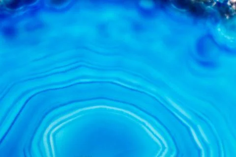 Abstract background, blue agate slice mineral round striped Stock Photos