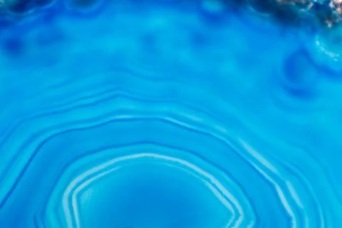 Abstract background, blue agate slice mineral round striped Stock Photos