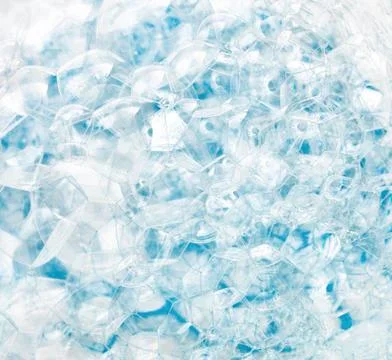 Abstract background of blue soap bubbles. Concept of cleansing Stock Photos