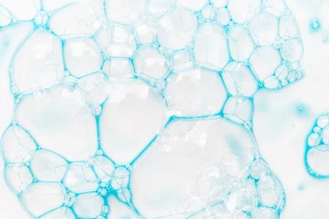 Abstract background of blue soap bubbles. Concept of cleansing Stock Photos