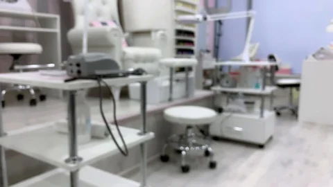 Abstract background. Blurred background in the beauty salon. Manicurists make  Stock Footage 119892099