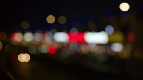 Abstract background of blurred car headlights at night with soft bokeh lights Video stock 321544503
