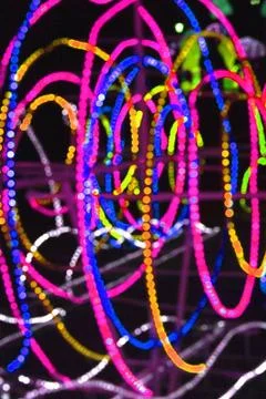 Abstract background of blurred lines on dark background. Stock Photos