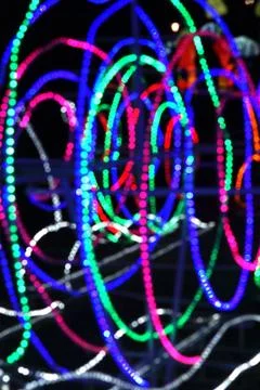 Abstract background of blurred lines on dark background. Stock Photos