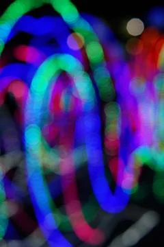 Abstract background of blurred lines on dark background. Stock Photos