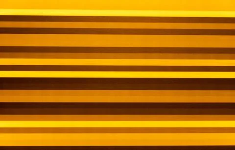 Abstract background of blurred multicolored stripes in yellow green. 스톡 사진