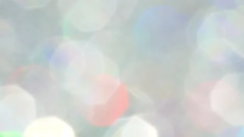 Abstract background of blurred rainbow color glitter, twinkle light, lens flare Stock Footage 143378076