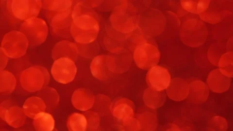 Abstract background of blurred red color glitter, real light leaks, lens flare Video stock 150345016