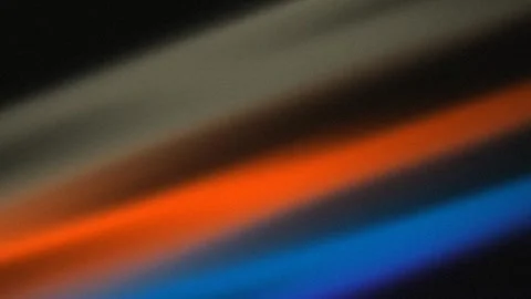 Abstract Background with Blurred Vibrant Orange and Blue Diagonal Light Streaks Stock Footage 337228598