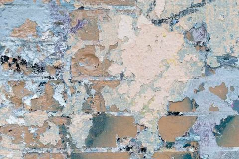 Abstract background of brick wall, texture with spots and layers of old paint Stock Photos