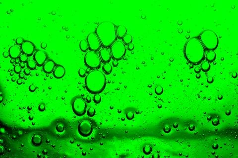 Abstract background of bright green bubbles closeup Stock Photos