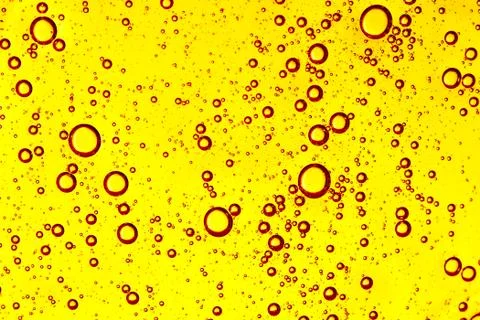 Abstract background of bright yellow-red bubbles close-up Stock Photos