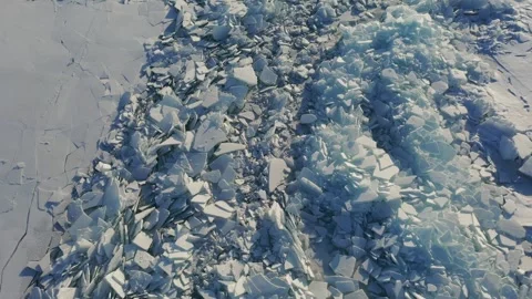 The abstract background of broken ice shows a pile of ice fragments Stock Footage 320792482