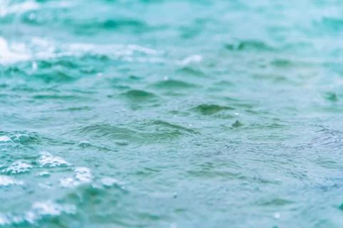 Abstract background bubbles falling rain on water Stock Photos