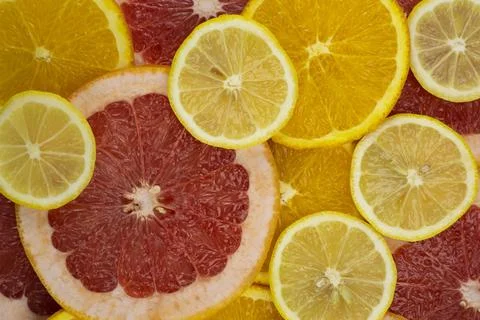 Abstract background of citrus slices. Close-up. Studio photography. Stock Photos