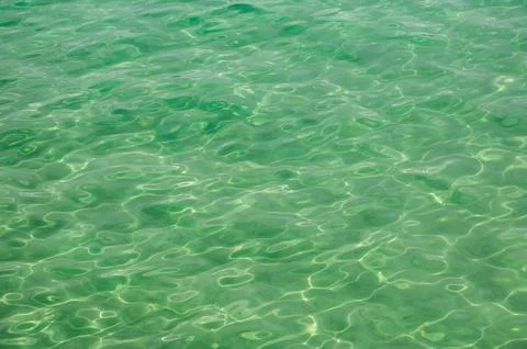 Abstract background of clear turquoise water with natural sunlight reflecti.. Stock Photos