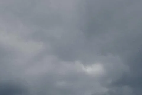 Abstract background from cloudy gray sky. Stock Photos