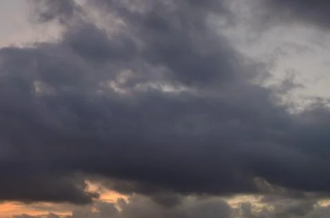 Abstract background of cloudy sunset sky golden hour. Stock Photos