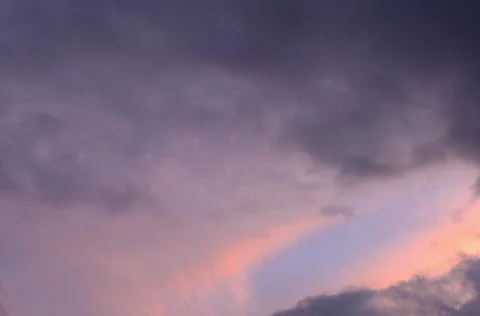 Abstract background of cloudy sunset sky blue hour. Stock Photos