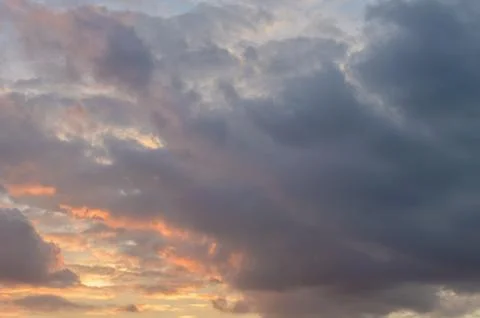 Abstract background of cloudy sunset sky golden hour. Stock Photos