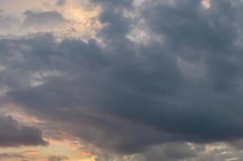 Abstract background of cloudy sunset sky golden hour. Stock Photos