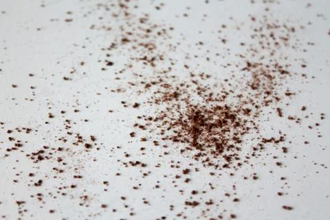 Abstract background with cocoa powder on white table Stock Photos