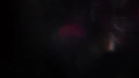 Abstract background of colored bokeh lights on black Video stock 318520472