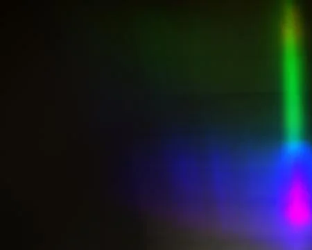 Abstract background of colored lights with blur effect in black and purple Stock Illustration