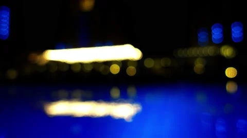 Abstract background of colored lights. Defocused image of the pool water surf Stock Footage 172193057
