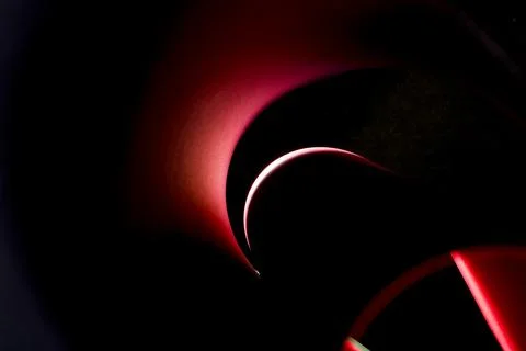 Abstract background of colored paper sheets on a black background Stock Photos