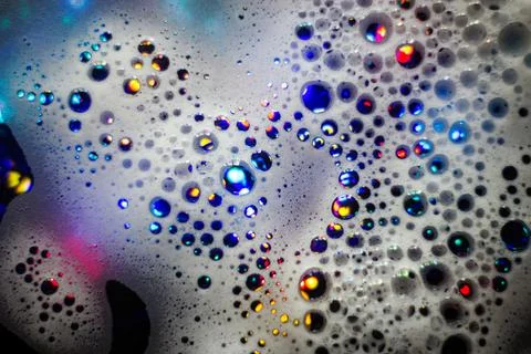 Abstract background. Colored soap foam texture. Shampoo foam with bubbles. Foto stock